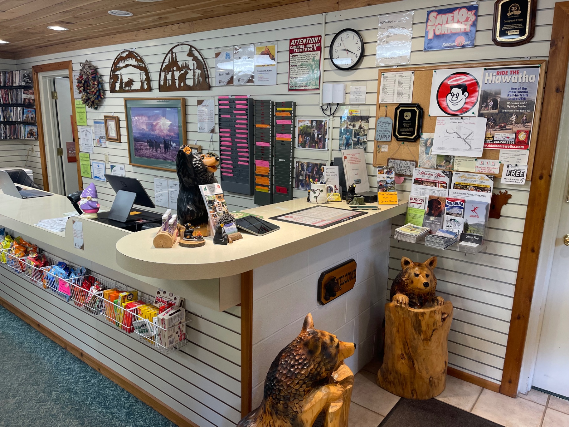 Front desk and check-in counter with candy, gum and Montana travel brochures