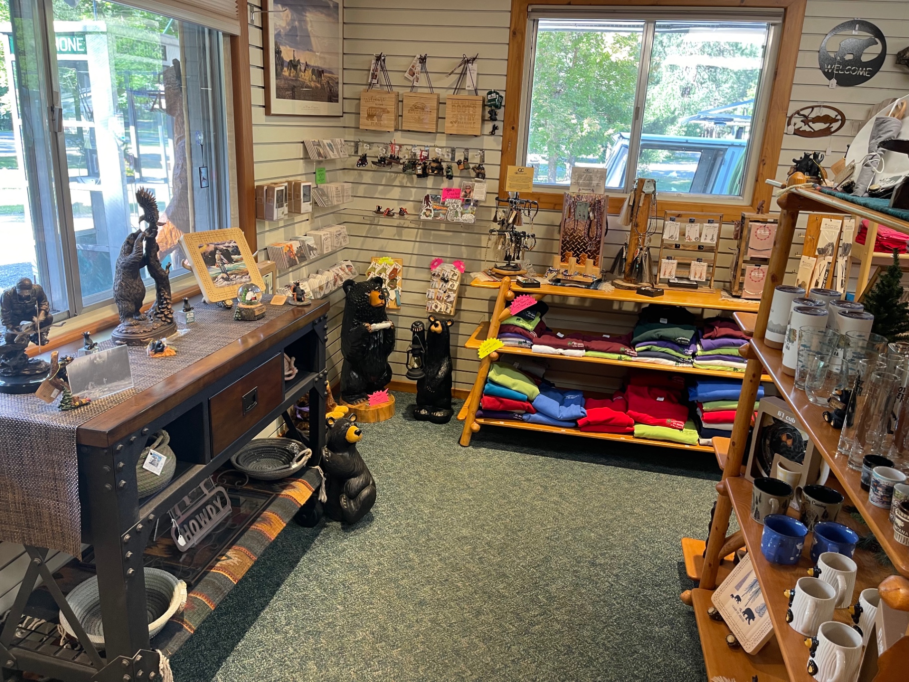 Montana souvenirs, black bear carvings, mugs, glassware and gift items throughout the store